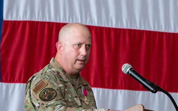 Cage takes command of 436th MGG