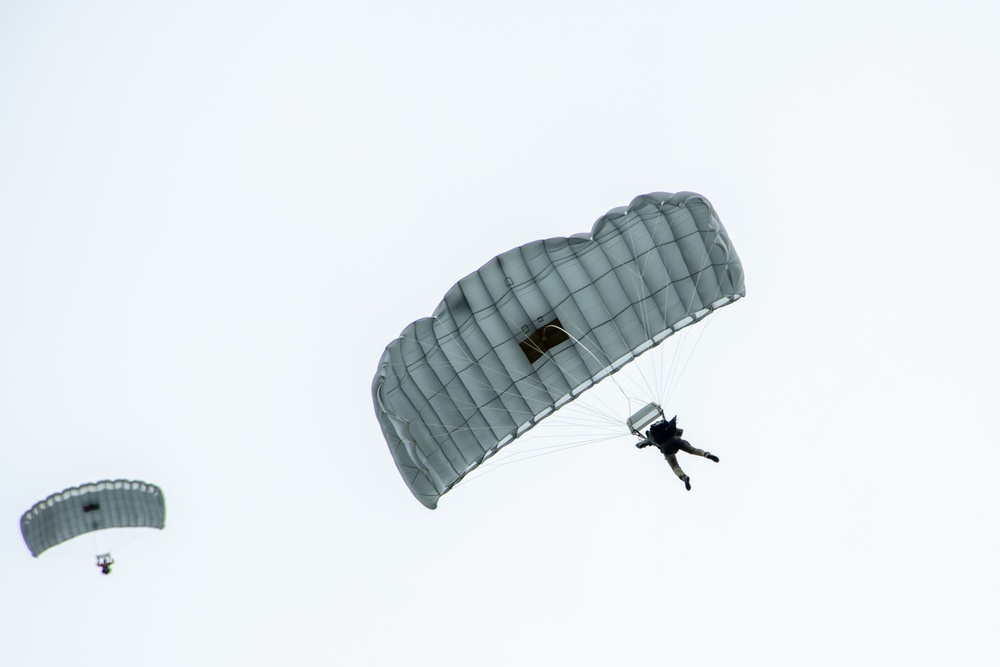 Pararescuemen, paratroopers, tactical air controllers conduct joint airborne operations