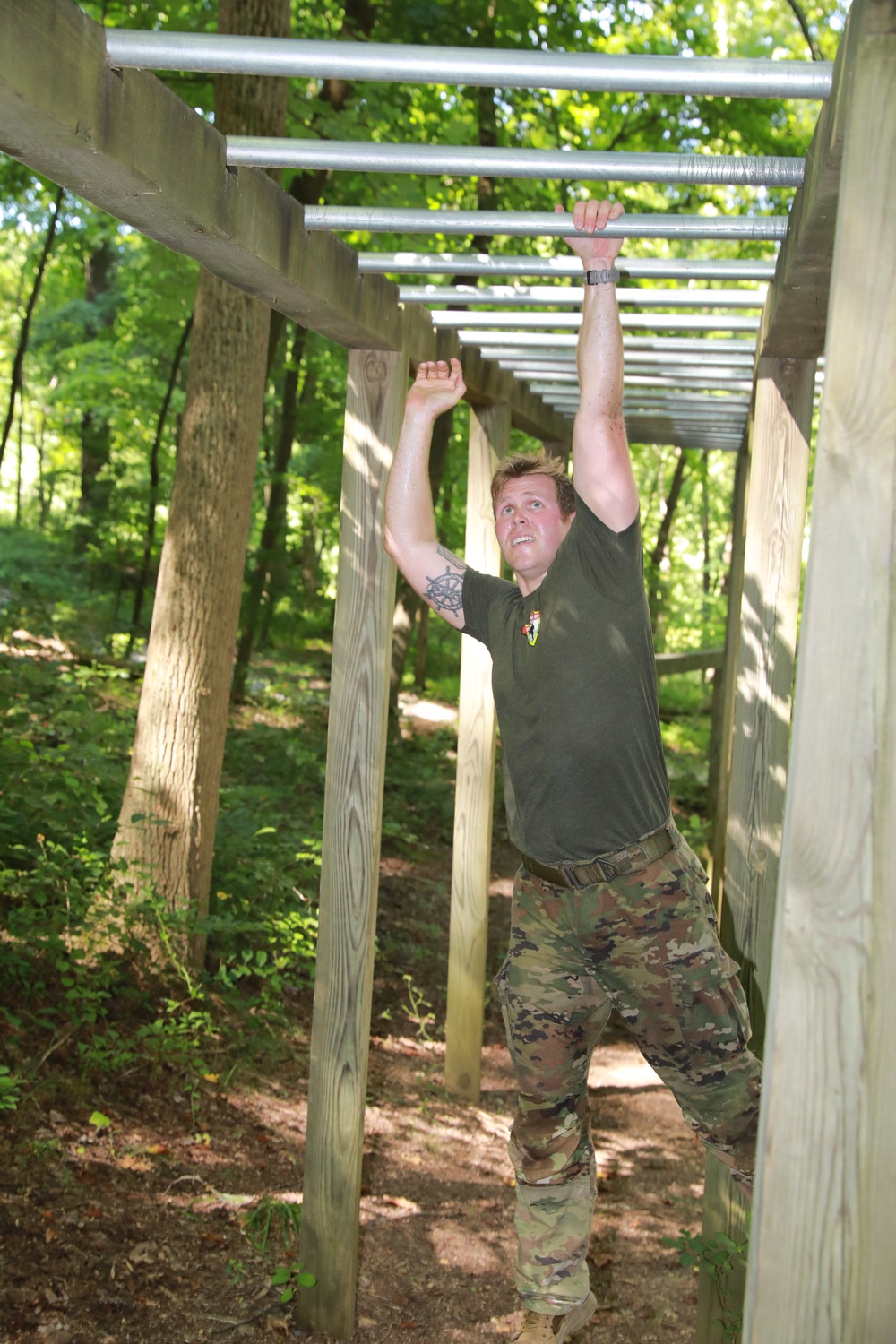 Soldier Traverses Monkey Bars