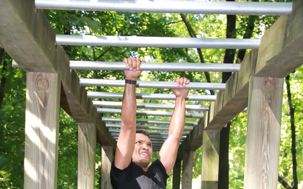 Soldier Traverses Monkey Bars (2 of 2)