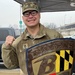 Soldier Holds a Baltimore Ravens Shield