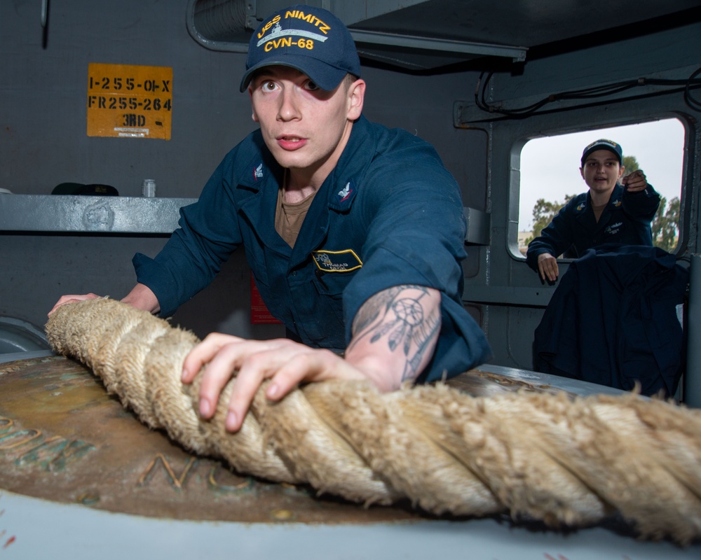 Sailor Heaves Around Line