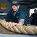 Sailor Heaves Around Line