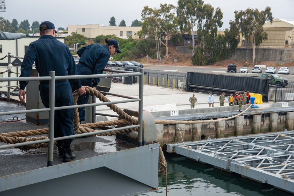 Sailors Heave Around Line
