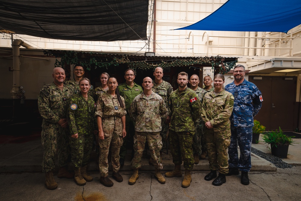 RAAF Group Capt. Glenn Pascoe, partner nation medical personnel work together during RIMPAC 2024
