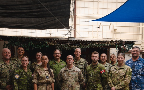 RAAF Group Capt. Glenn Pascoe, partner nation medical personnel work together during RIMPAC 2024