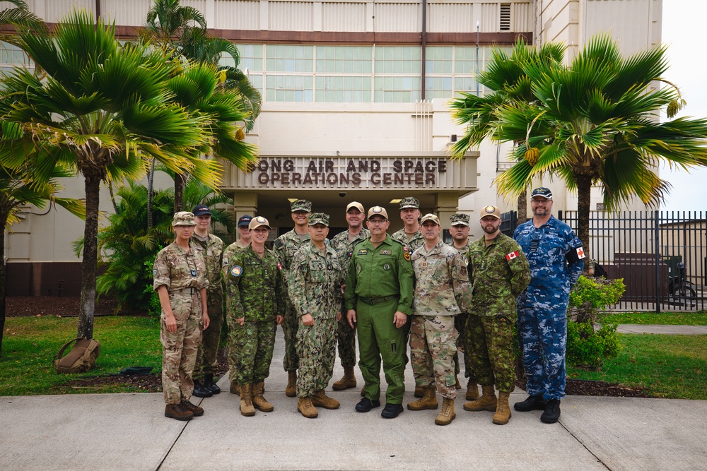 Royal Australian Air Force Group Captain Glenn Pascoe works alongside medical personnel during RIMPAC 2024