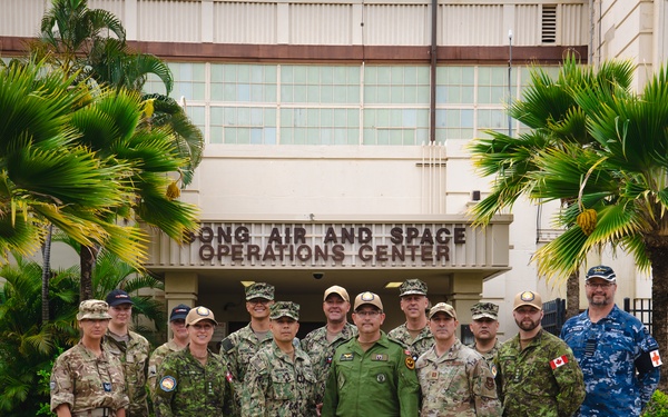 Royal Australian Air Force Group Captain Glenn Pascoe works alongside medical personnel during RIMPAC 2024