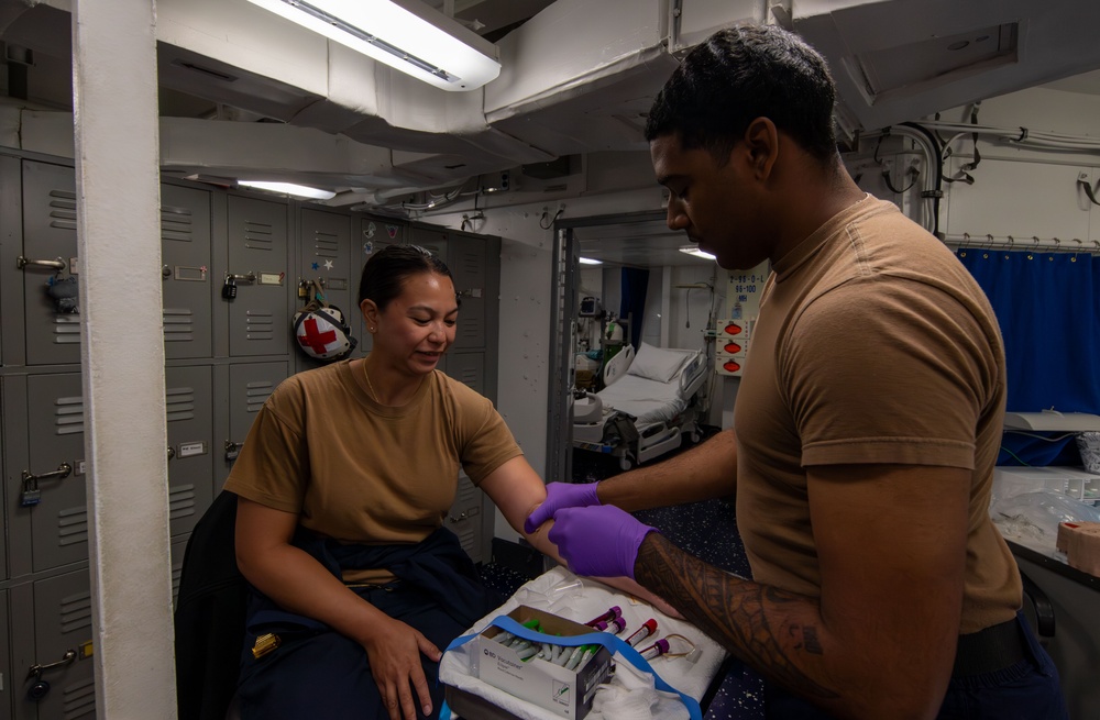 Abraham Lincoln holds a walking blood bank