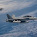 63rd Air Refueling Squadron refuels Navy F-18