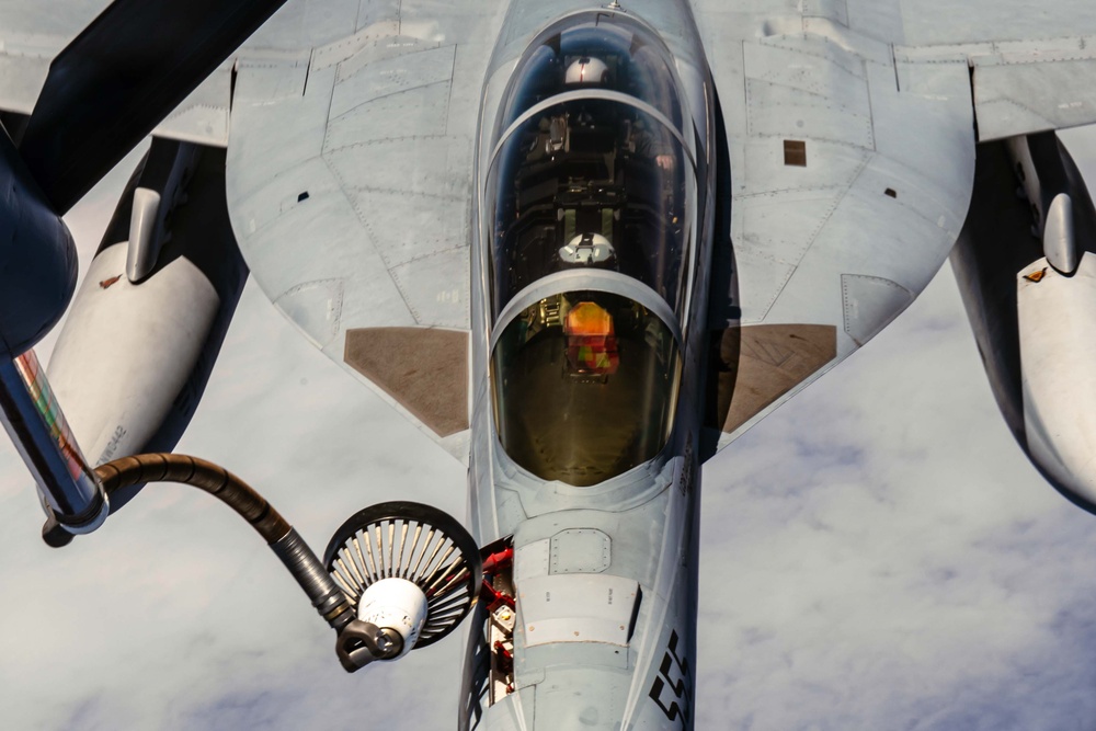 63rd Air Refueling Squadron refuels Navy F-18