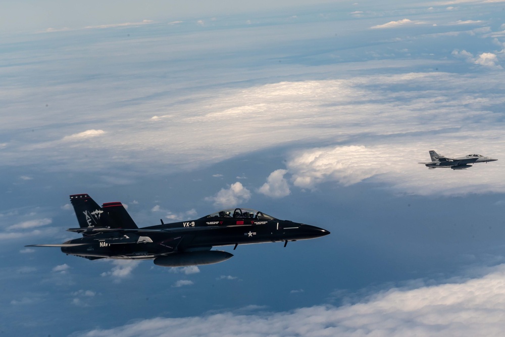 63rd Air Refueling Squadron refuels Navy F-18