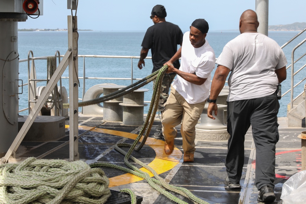 USNS Burlington Departs From Jamaica