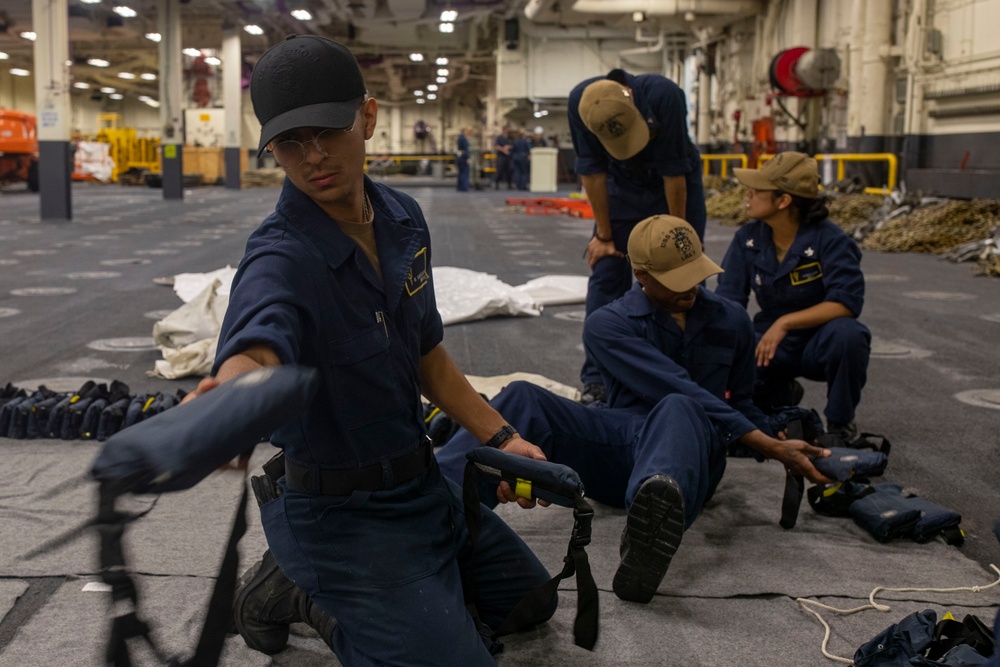 Tripoli Sailors Organize Life Preservers