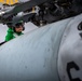 A Nimitz Sailor Performs Maintenance On Aircraft