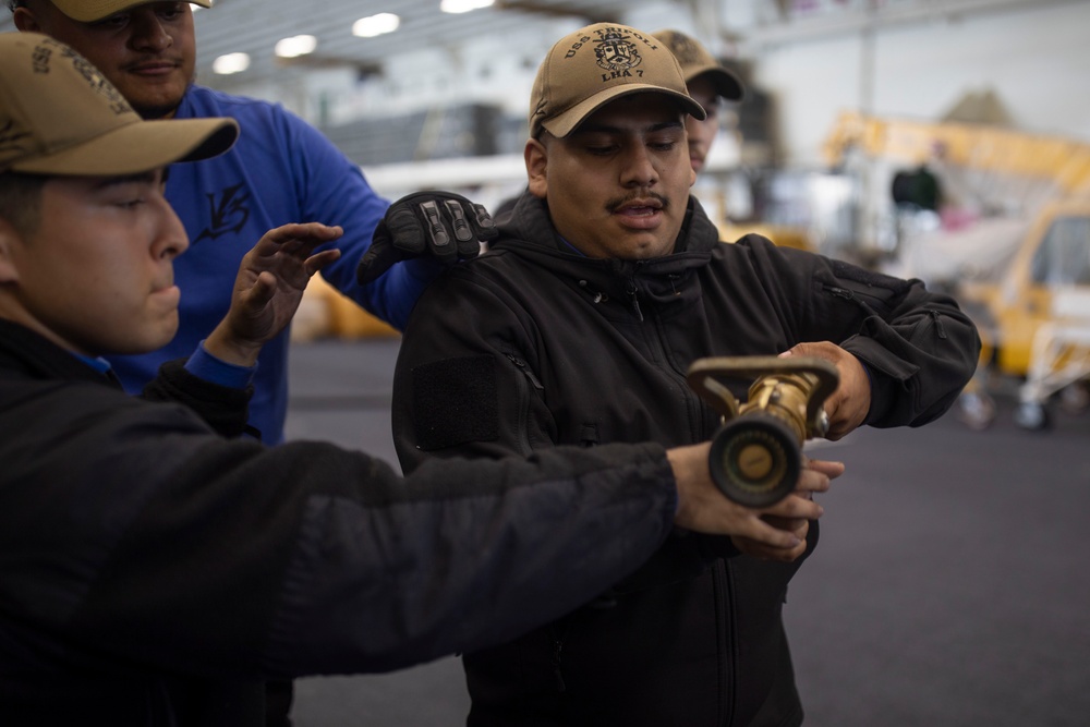 Tripoli Sailors Complete A Firefighting Drill