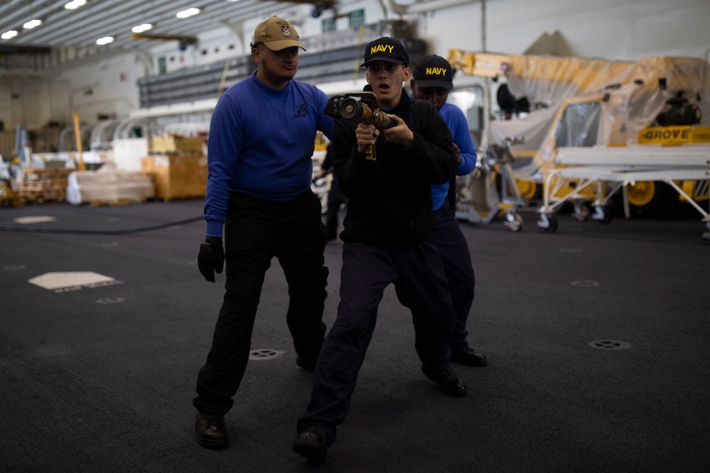 Tripoli Sailors Complete A Firefighting Drill