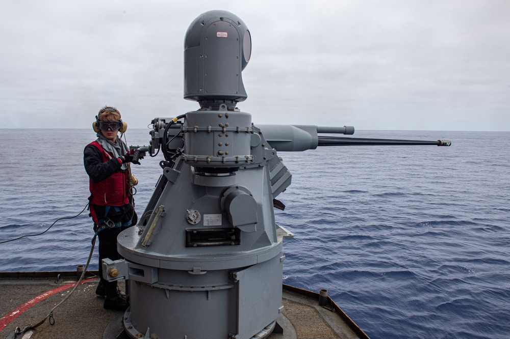 USS Ronald Reagan (CVN 76) Sailors fire an MK-38 machine gun