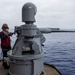 USS Ronald Reagan (CVN 76) Sailors fire an MK-38 machine gun