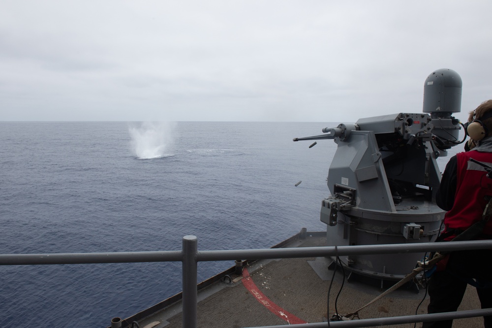 USS Ronald Reagan (CVN 76) Sailors fire an MK-38 machine gun