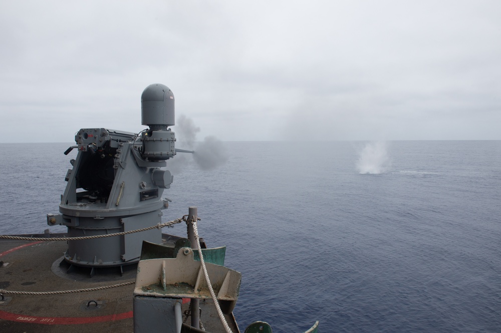 USS Ronald Reagan (CVN 76) Sailors fire a MK-38 machine gun