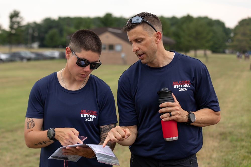 Maj. Sterling Broadhead helps 1st Lt. Susan Janfrancisco,