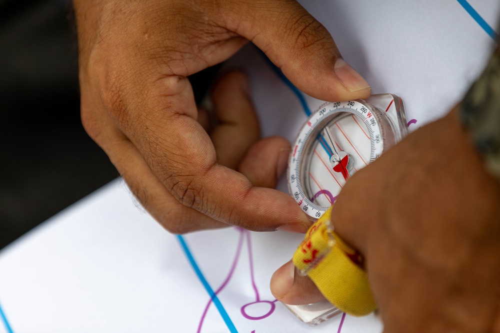 Staff Sgt. David Duran looks at his compass