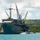 USS Frank Cable conducts an expeditionary reload of TLAMs with USS Florida