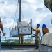 USS Frank Cable conducts an expeditionary reload of TLAMs with USS Florida