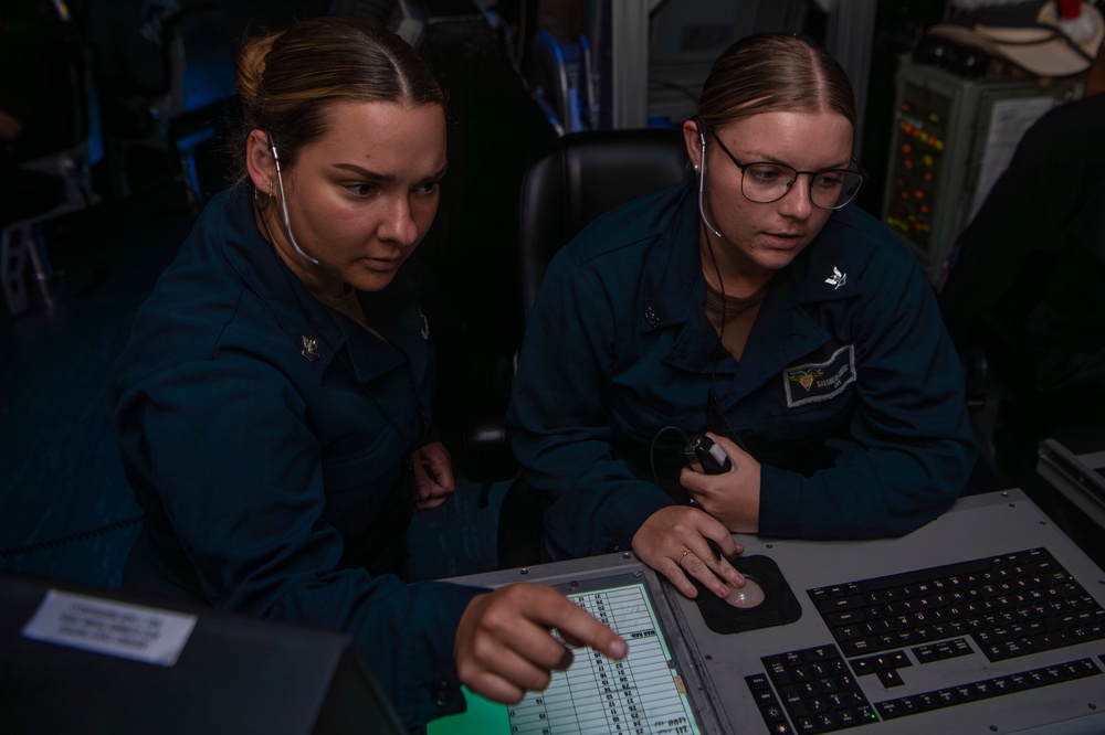 USS Carl Vinson air traffic controllers direct flight operations during RIMPAC 2024