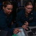 USS Carl Vinson air traffic controllers direct flight operations during RIMPAC 2024