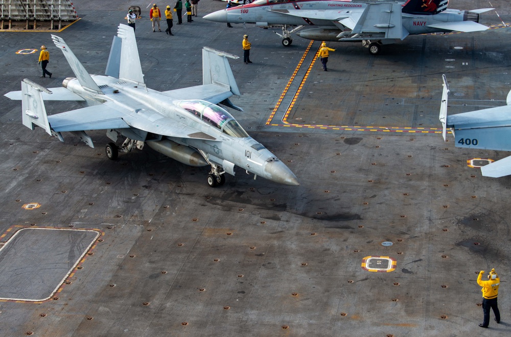 Nimitz Sailor Directs Aircraft On Flight Deck