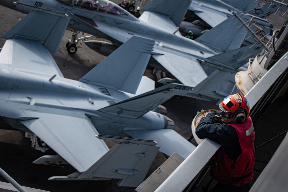 A Nimitz Sailor Observes Flight Operations