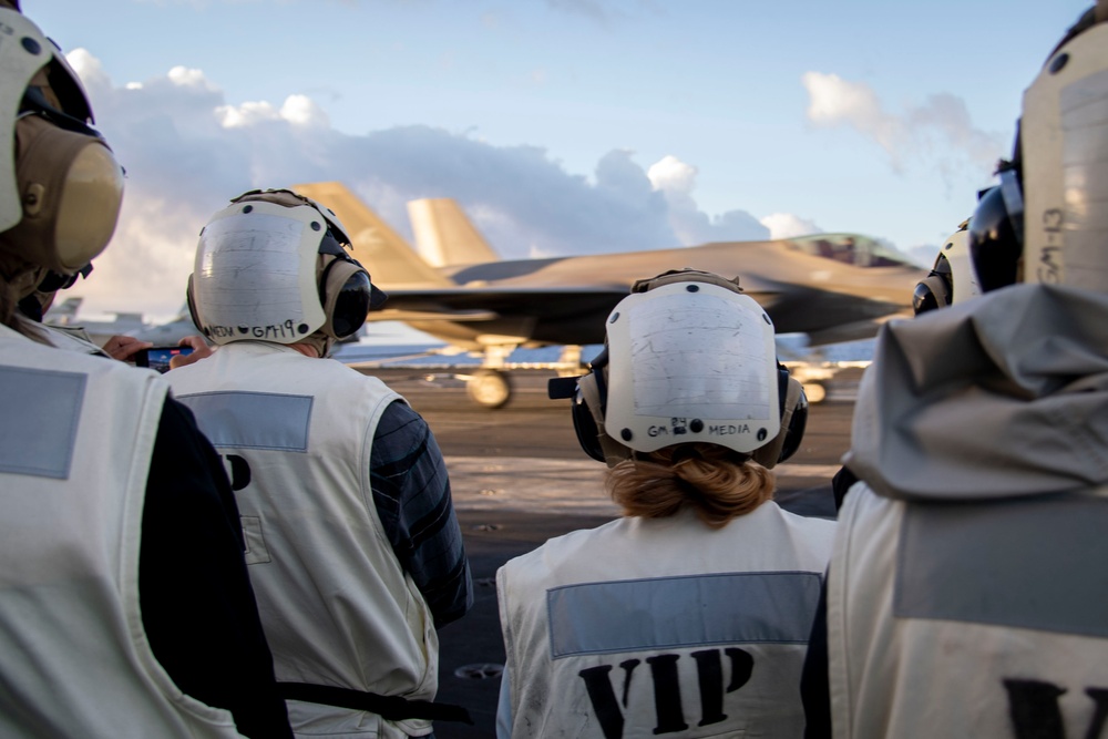 Distinguished visitors view flight operations aboard USS Carl Vinson during RIMPAC 2024