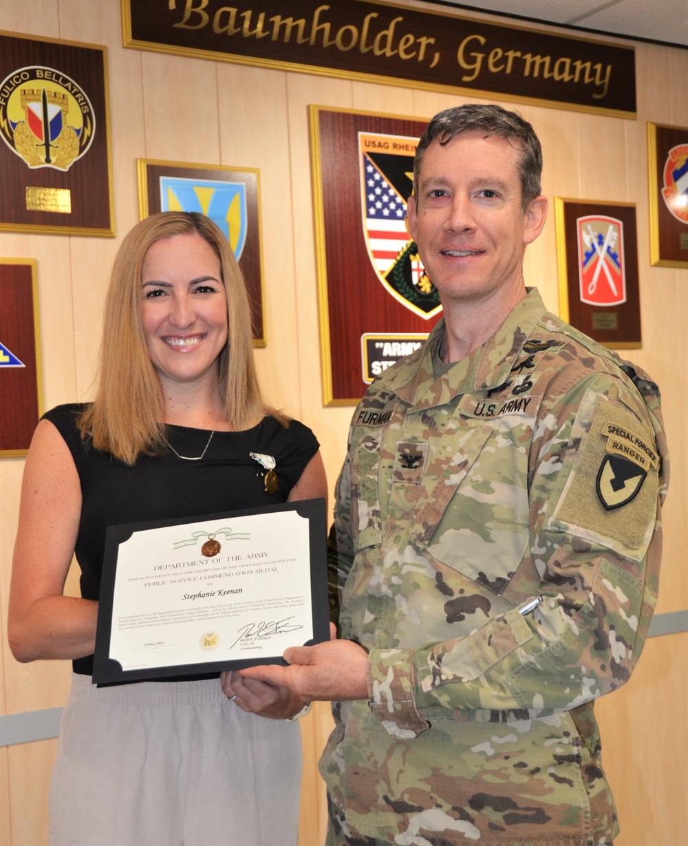 USAG Rheinland-Pfalz awards Public Service Commendation Medal to Stephanie Keenan for community contributions