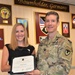 USAG Rheinland-Pfalz awards Public Service Commendation Medal to Stephanie Keenan for community contributions