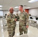 38th ID human resource sergeant receives challenge coin from leadership