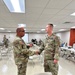 38th ID human resource sergeant receives challenge coin from leadership