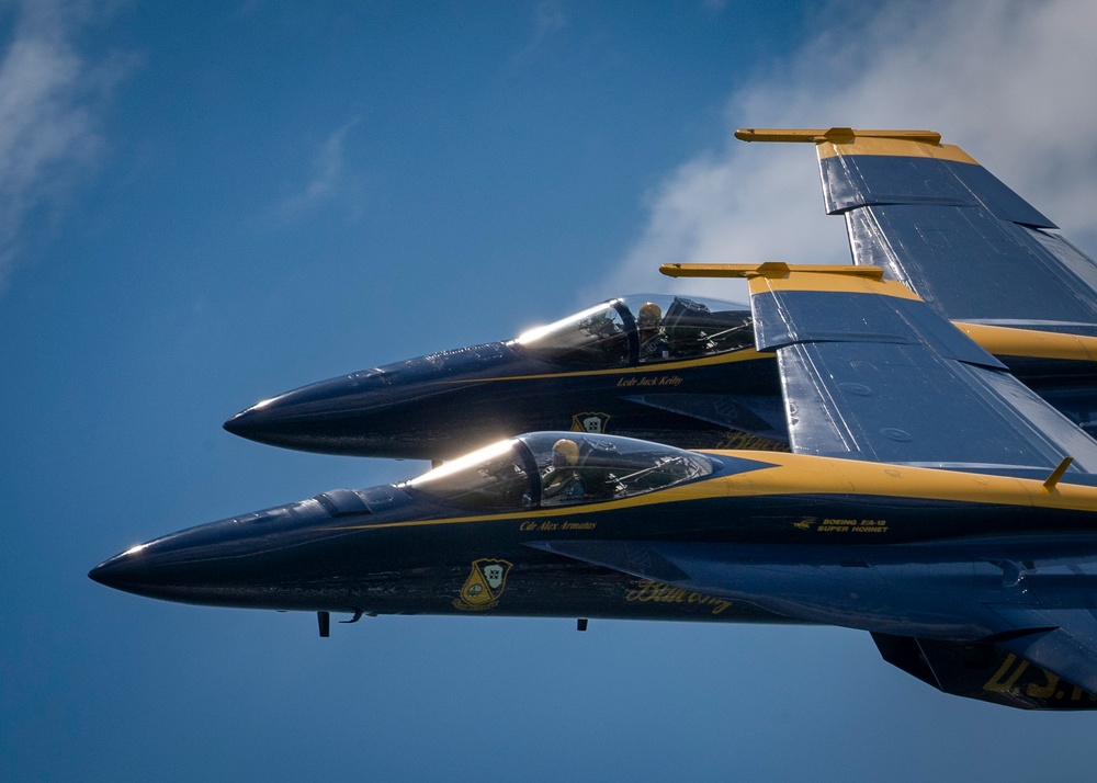 The Navy Flight Demonstration Squadron, the Blue Angels, perform in Pensacola Beach, FL.