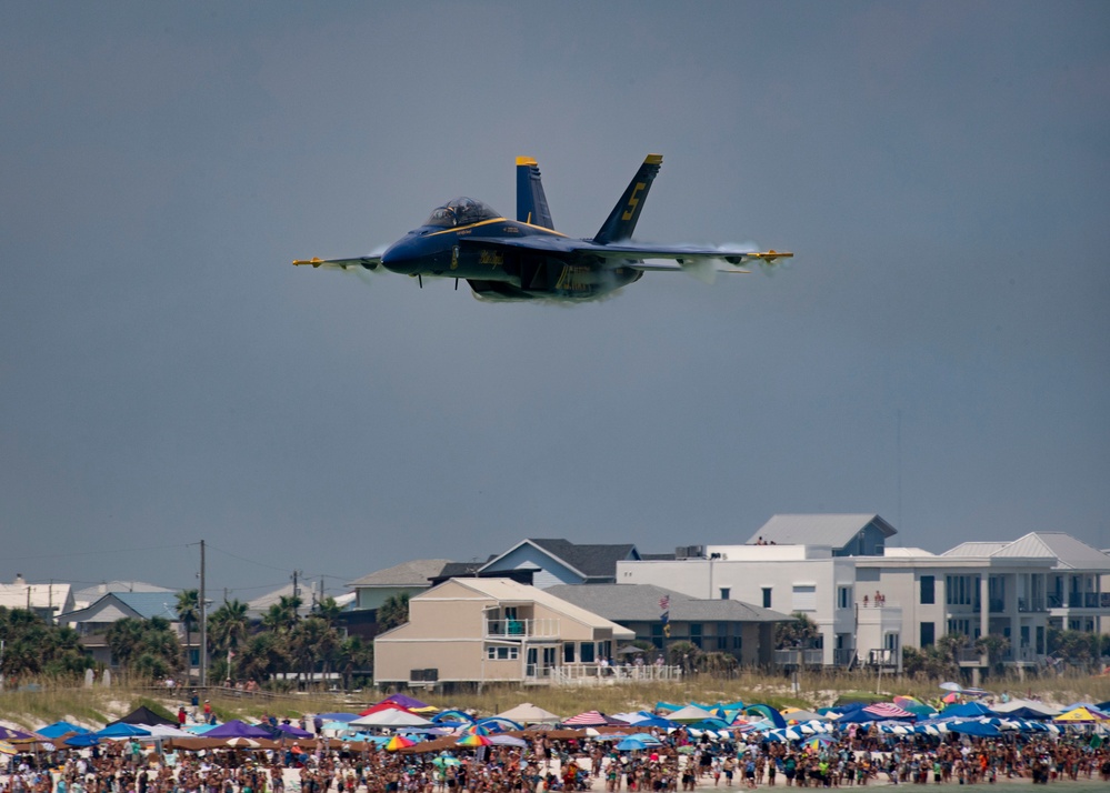 The Navy Flight Demonstration Squadron, the Blue Angels, perform in Pensacola Beach, FL.