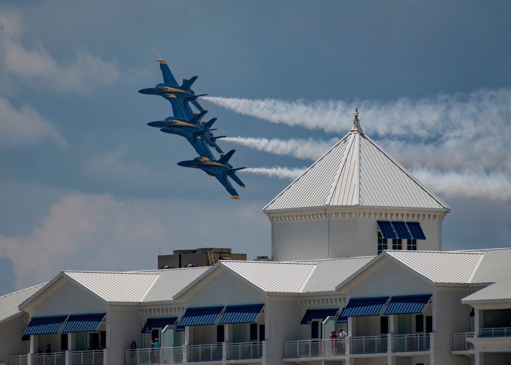 The Navy Flight Demonstration Squadron, the Blue Angels, perform in Pensacola Beach, FL.