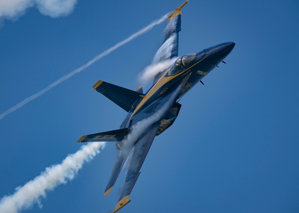 The Navy Flight Demonstration Squadron, the Blue Angels, perform in Pensacola Beach, FL.