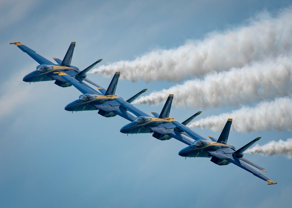 The Navy Flight Demonstration Squadron, the Blue Angels, perform in Pensacola Beach, FL.