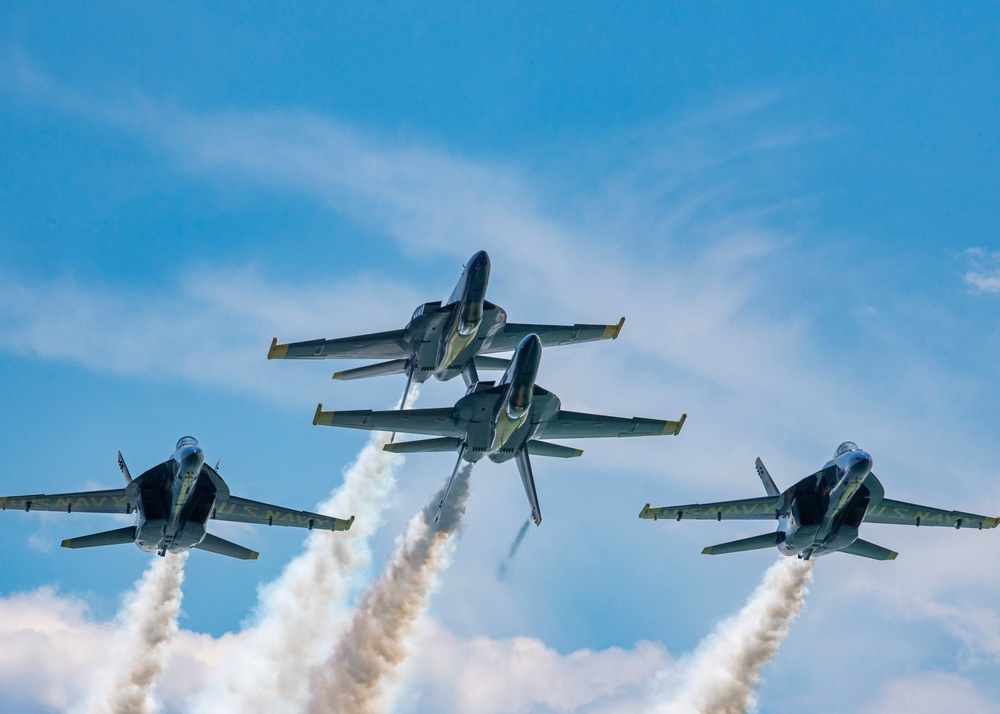 The Navy Flight Demonstration Squadron, the Blue Angels, perform in Pensacola Beach, FL.