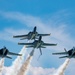 The Navy Flight Demonstration Squadron, the Blue Angels, perform in Pensacola Beach, FL.