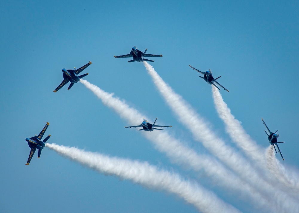 The Navy Flight Demonstration Squadron, the Blue Angels, perform in Pensacola Beach, FL.