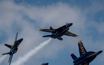 The Navy Flight Demonstration Squadron, the Blue Angels, perform in Pensacola Beach, FL.