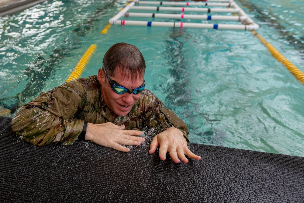 Col. Brent Dishman pulls up on a platform