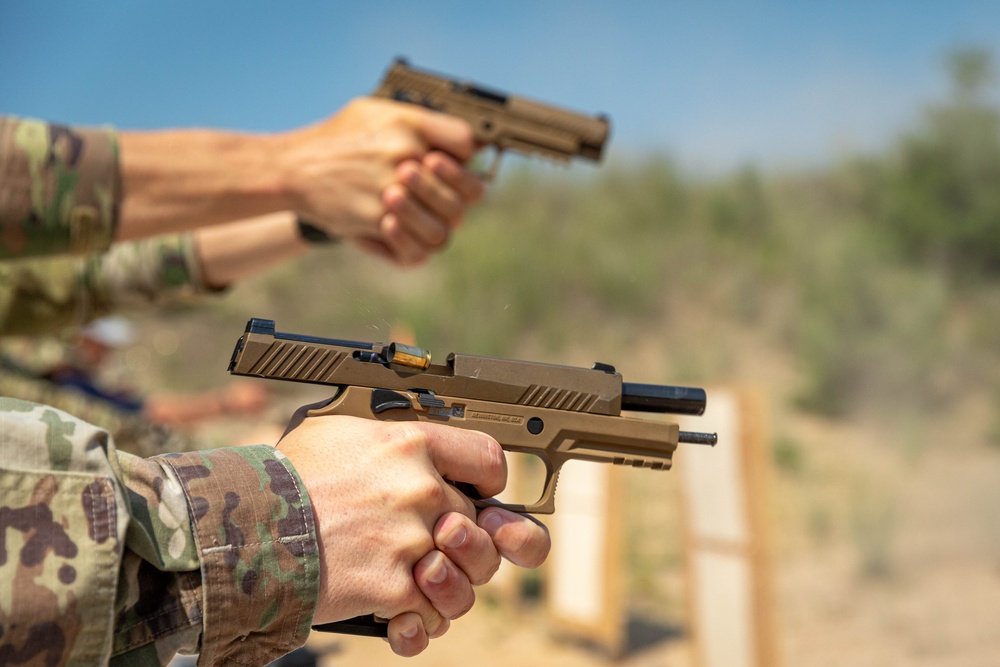 Team USA candidates fire their M17 pistols