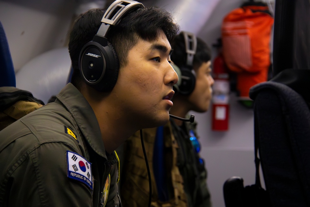 USN Sailors hosts ROKN sailors on a P-8A flight during RIMPAC 2024